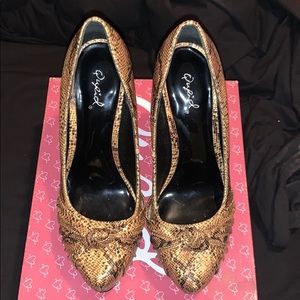 Snakeskin pumps